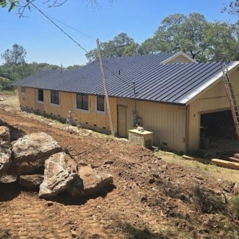 Standing seam metal roof installation on a Sacramento-area home
